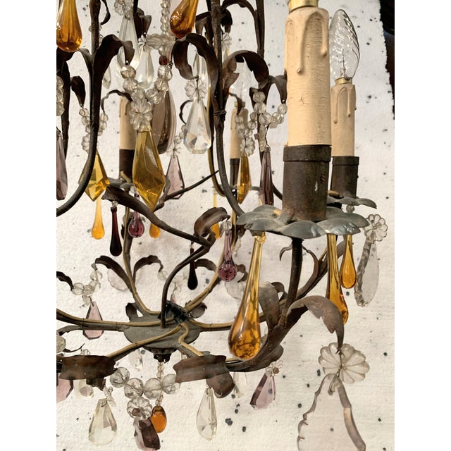 Louis XV style cage chandelier Iron and patinated sheet metal frame Colored pendants and teardrops Good condition...