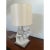 This is a natural polished quartz lamp by Jacques Garcia for Baker Furniture, it has a silver base with a switch on the...