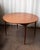 A Danish teak dining table produced in the 1960s in the manner of Grete Jalk — sharing the restrained, practical...