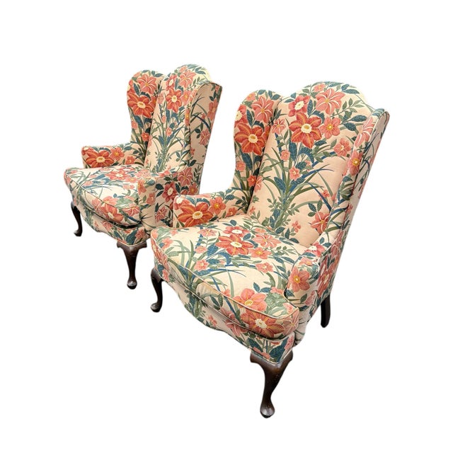 Ethan Allen wing back chairs, a pair. Wooden cabriole legs and solid sturdy chairs. Very fun orignal fabric but the chairs...