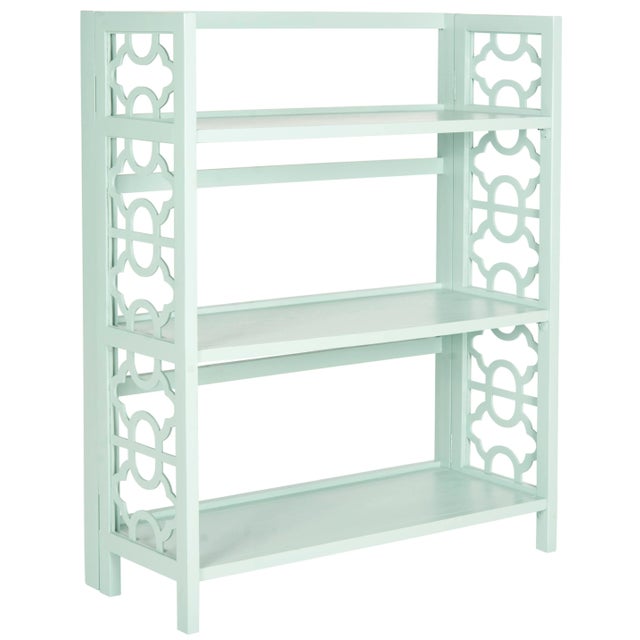 Organize in style with the distinctive low bookcase crafted of solid elm wood with a pretty celadon finish.Whether used...