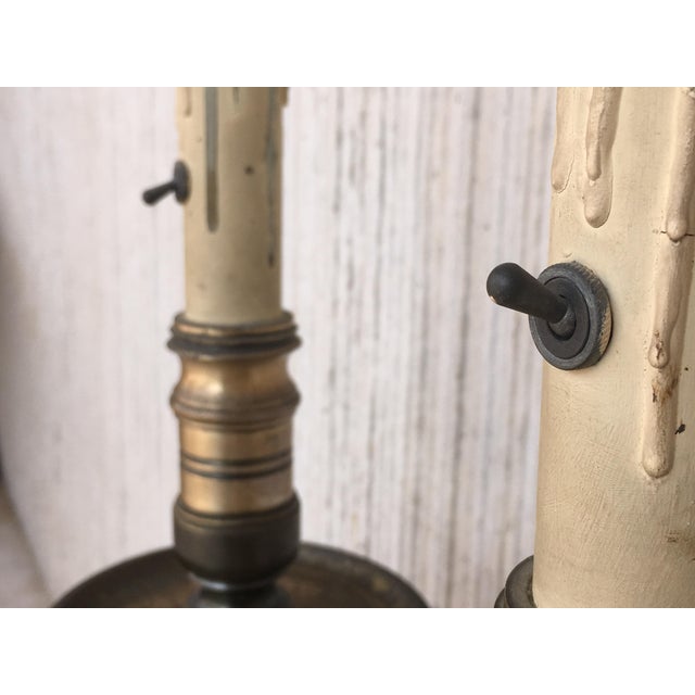 About Pair of Renaissance style bronze pricket lamps. These large pricket lamps provide the perfect balance for rooms with...