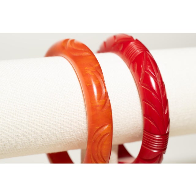Vintage Carved Bakelite Bangle Bracelets in Red and Orange, 1930's, Pair Of For Sale - Image 13 of 17