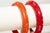 Vintage Carved Bakelite Bangle Bracelets in Red and Orange, 1930's, Pair Of For Sale - Image 13 of 17