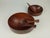 Following Padouk-wood set consisting of an oval shell with a two-part lettuce cutlery and a smaller oval bowl with a...