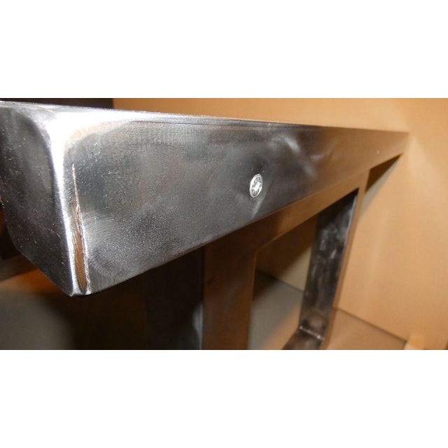 Conservative restoration of an industrial table with solid mahogany top 4,5 cm thick, treated and sanded. Subsequently...