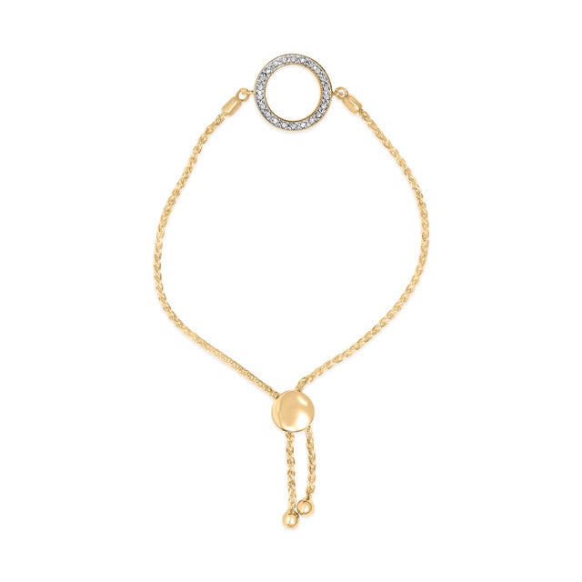An ode to effortless radiance, this wrist treasure is crafted in .925 sterling silver bathed in luxurious yellow 24K gold...
