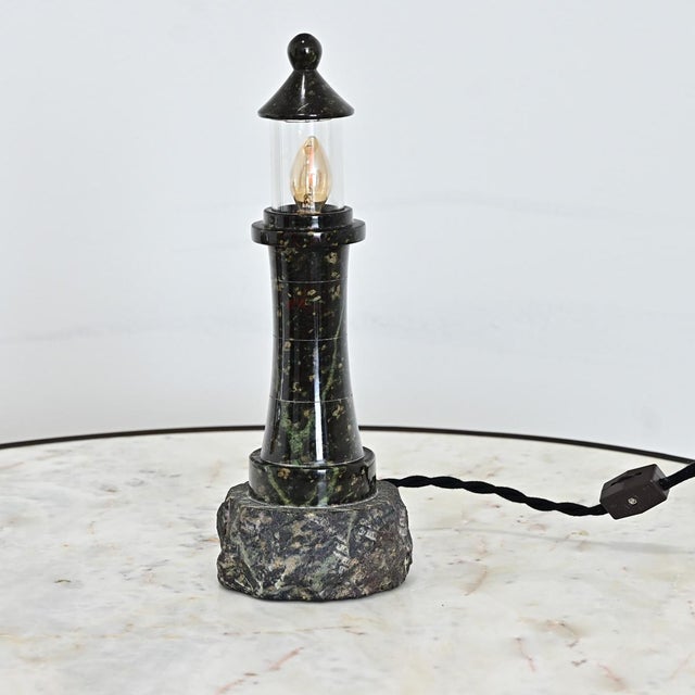 This petite Cornish lighthouse lamp from Cornwall on the English coast is a unique and charming piece of maritime history...