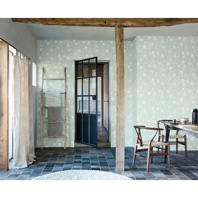 One of the earliest and most well-loved of William Morris‚Äôs designs this wallpaper has been carefully reworked from the...