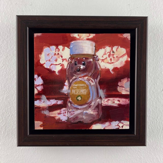 The artwork depicts a whimsical honey bear bottle, rendered in vibrant oil paints that capture its playful essence against...