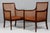 Ole Wanscher set of Bergeres lounge chairs in mahogany. Seat, back and sides with patinated cane. Cushions of patinated...