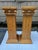 A matching pair of solid American pine pedestals featuring interior storage with hinged doors. Each pedestal features four...