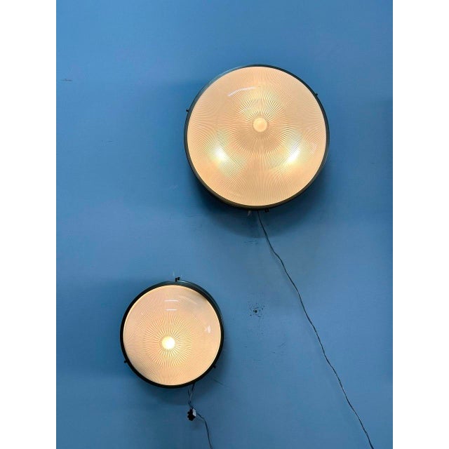 Wall lamps in various sizes, "Sigma" model designed by Sergio Mazza, produced by Artemide. Small dimensions: diameter 26...