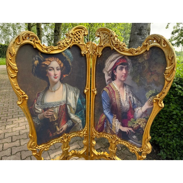 A romantic 1960 French Louis XVI-style two-panel room divider screen, beautifully handmade from solid beechwood with an...