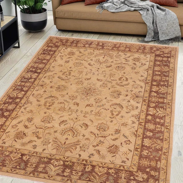 "Enhance the ambiance of your home with this magnificent Persian-influenced Turkish hand-knotted rug made by skilled...