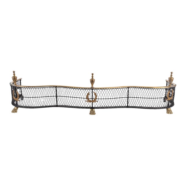 Brass and Steel Woven Serpentine Fireplace Fender With Wreath Designs & Paw Feet For Sale