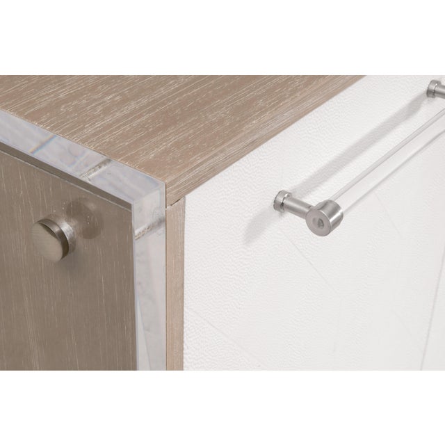 Create a clean and polished look within your home with the Lorin Shagreen Media Sideboard by Essentials for Living. This...