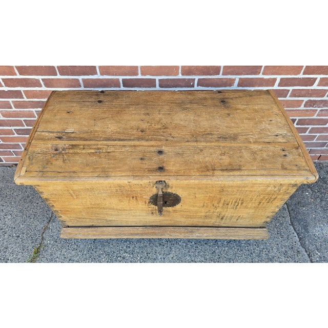 This lovely 18th century trunk has a beautiful light patina and hand wrought hardware throughout. The fancy dovetail...
