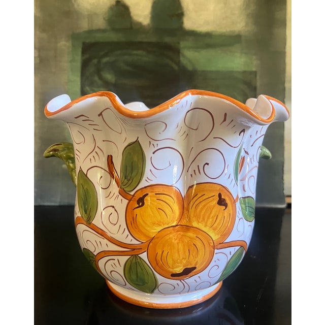 Vintage hand painted Italian vase or wine bucket with a ruffle top and painted oranges.