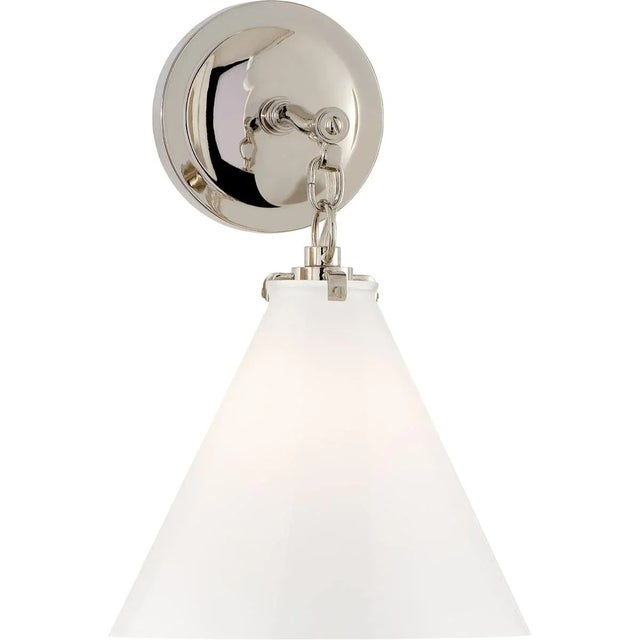 Katie Small Conical Sconce in Polished Nickel with White Glass Designer: Thomas O'Brien Height: 14.4" Extension: 10.25"...