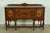A beautiful antique English Jacobean style sideboard buffet or credenza In the manner of Berkey & Gay USA, Circa 1920s...
