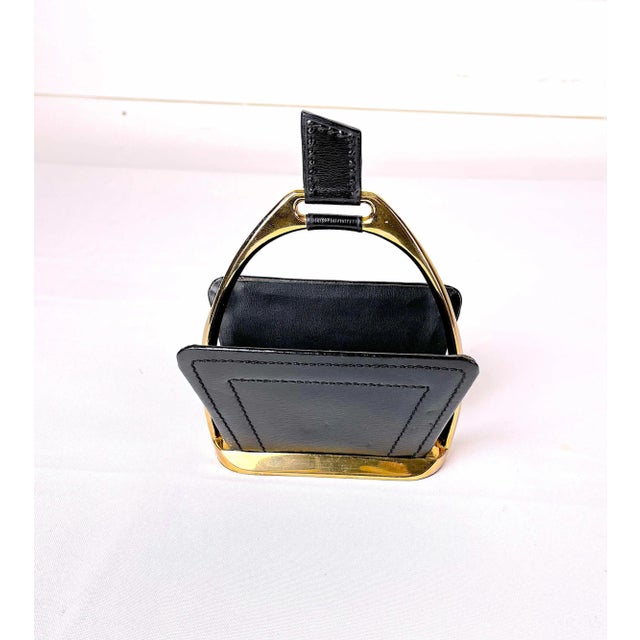 A vintage mid-century chic and so elegant Letters Holders, by French well known Maison Longchamp in a horse stirrup shape,...