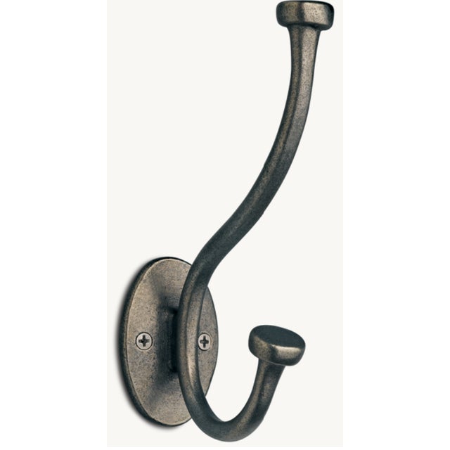 Restoration Hardware, Dakota Button Hooks. A decorative wall hook featuring a distinct, vintage-inspired design shaped...