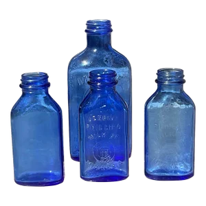 Set of 4 Vintage Cobalt Milk of Magnesia Bottles