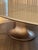 This oval dining table by Giorgetti, designed by Roberto Lazzeroni and created in 2018, is a striking example of...