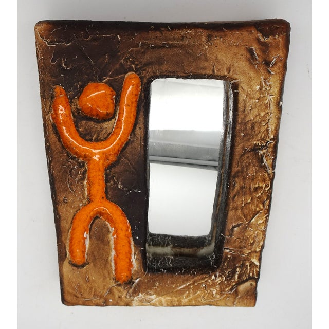 Mid-Century Modern French Ceramic Mirror, 1960s, in Very Good conditions. Designed 1960 to 1969 This piece has an...