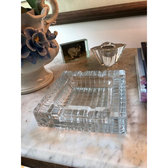 This contemporary Art Deco transparent ashtray will make a nice addition to any table setting. Sophisticated enough to be...