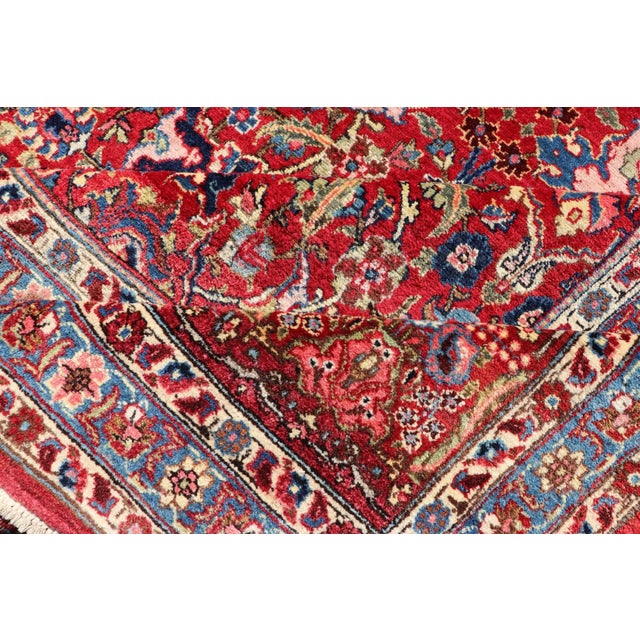 Large Antique Persian Fine Weave Tabriz in Red Background & Light Blue Guard Borders. For Sale - Image 11 of 13