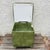 Add authentic Mid-Century Modern style to your home with this vintage green vinyl storage ottoman/hassock by Ryan &...