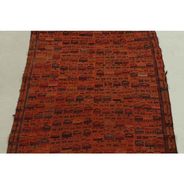 Handwoven in wool from Russia originating between 1920-1930, a 3x7 antique Verneh kilim enjoying an individualistic...