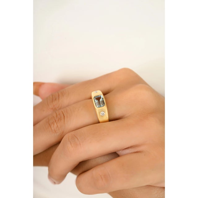 18K Gold Aquamarine and Diamond Signet Ring showcasing a bold 1.05 carat natural aquamarine gypsy-set in solid yellow...