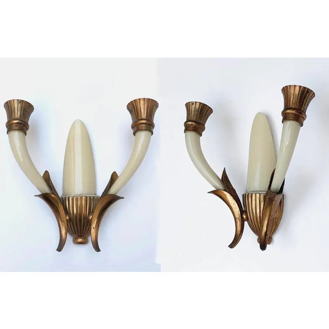 Elegant pair of wall lights attributed to Gugliemo Ulrich. They were produced in Venice, Italy, during 1940s. This is a...
