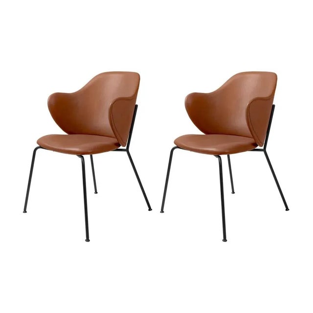 Set of 2 brown leather lassen chairs by Lassen Dimensions: W 58 x D 60 x H 88 cm Materials: Leather The Lassen chair by...