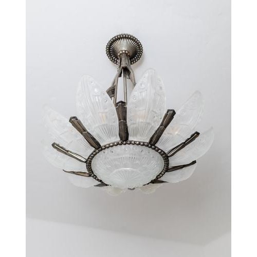 This exceptional antique Art Deco chandelier from the 1930s is an outstanding design by Georges Leleu, one of France's...