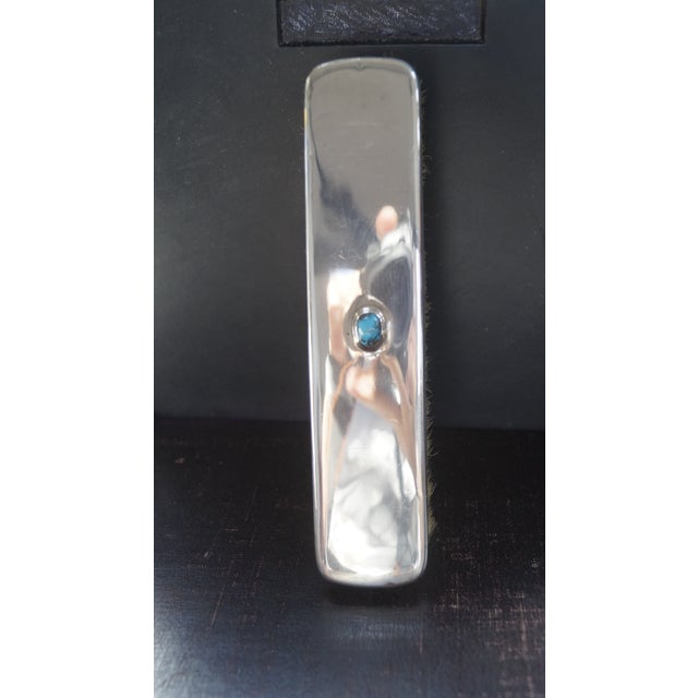 Silver & Turquoise Cymric Clothes Brush from Liberty & Co., 1906, in Very Good conditions. Designed 1890 to 1919 This...