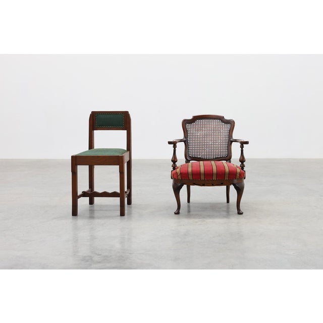 A charming late‑19th‑century French armchair in the Louis XV style, crafted in oak with a caned back and upholstered seat....