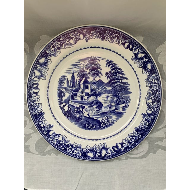The plate is in excellent condition, there are no signs of wear or damage. The colors are blue and white. The scene on the...