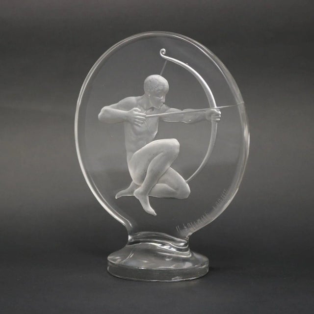 Rene Lalique Clear Glass 'Archer' Mascot. This model features a crouching archer with bow and arrow. Wheel cut makers...
