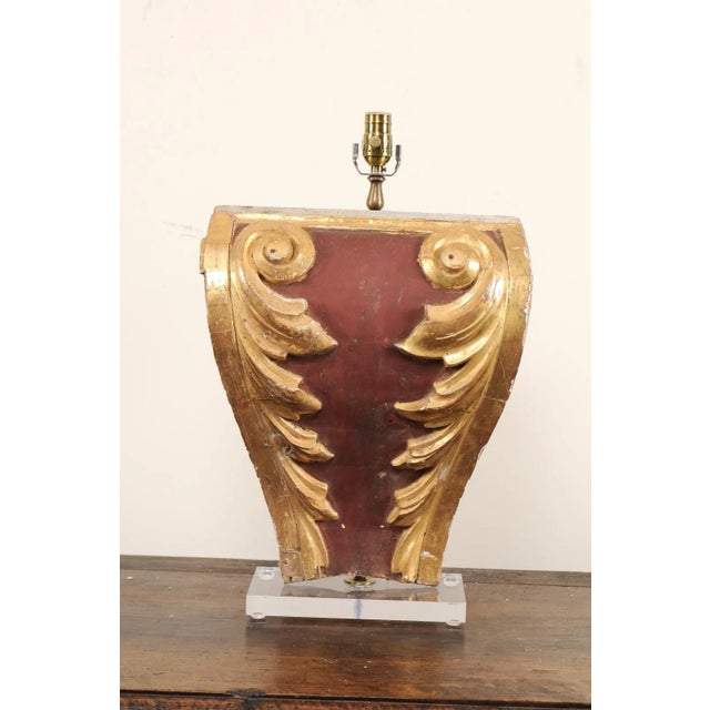 A 19th century Italian fragment table lamp. This table lamp has been fashioned from a 19th century Italian fragment...