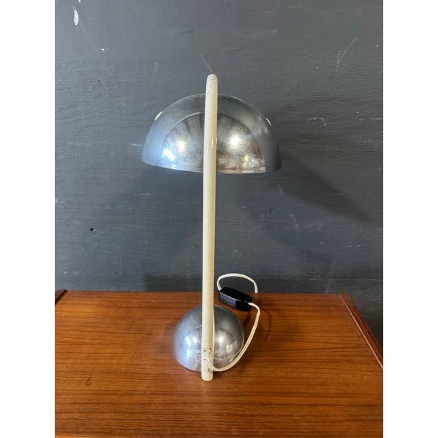 Art deco chrome lamp. Dimensions:16”h x8”w x 12”d. Condition:a few scratches on the shade otherwise great used condition.