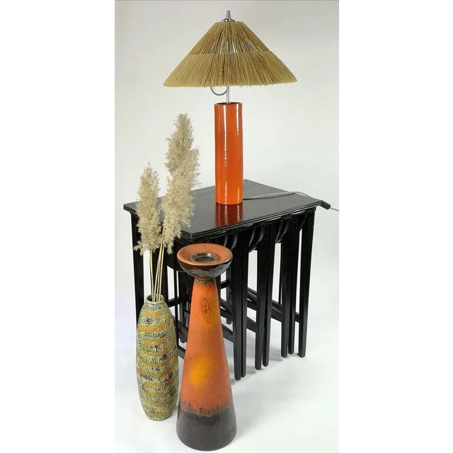 This 5-piece set consists of one rectangular large table with four small openable side tables of the same size. It's a...