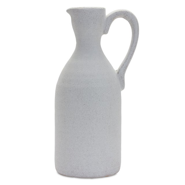 Add a touch of timeless elegance to your home with this Modern White Clay Pitcher Vase. Crafted from high-quality...