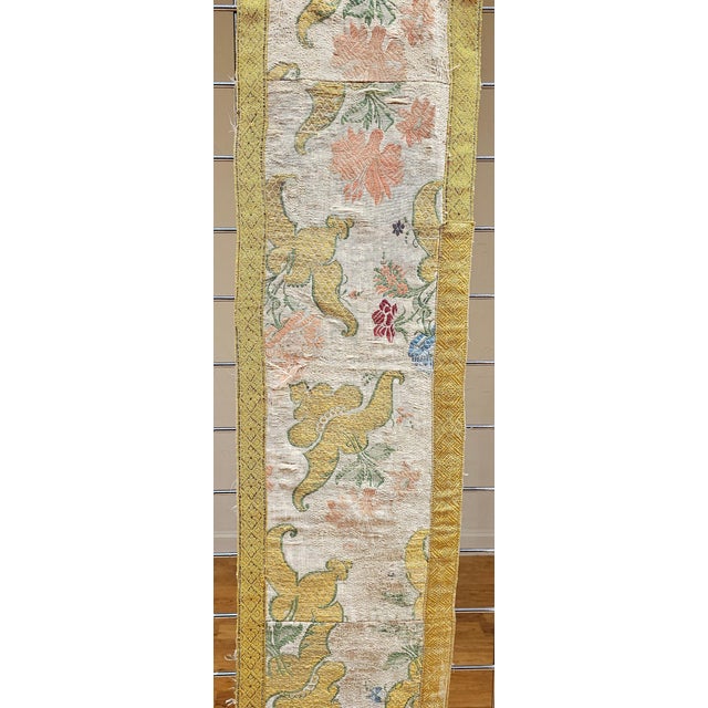 10.5″ x 90″ 18th Century hand-crafted silk and gilt threads embroidered European tapestry textile The piece is...