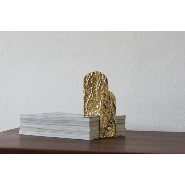 Set of 2 brass bookends from the 50's / 60's. A perfect addition to your arts and crafts library. Brass is a natural...