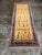 Design Plus Gallery presents a 3ft 2 in × 9ft 4 in Persian-Style Wool Runner Rug. This wool runner has a golden field with...
