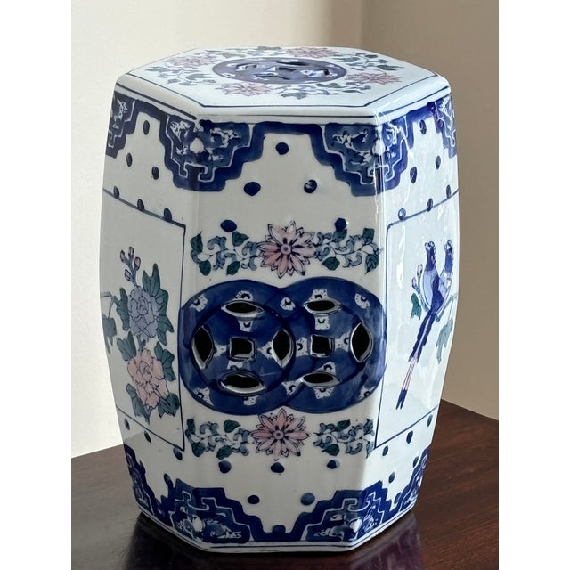 A small and very pretty late-20th century Chinoiserie porcelain garden stool. Love the handpainted blue & white floral...